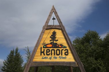 Low angle view of signboard, Kenora, Lake of The Woods, Ontario, Canada clipart