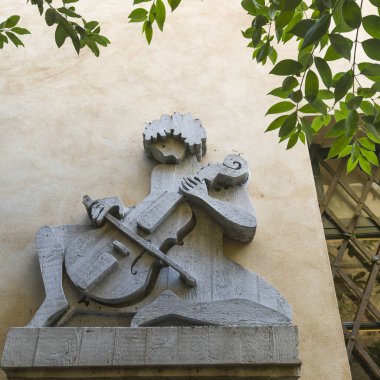 Sculpture on wall, Orvieto, Terni Province, Umbria, Italy clipart