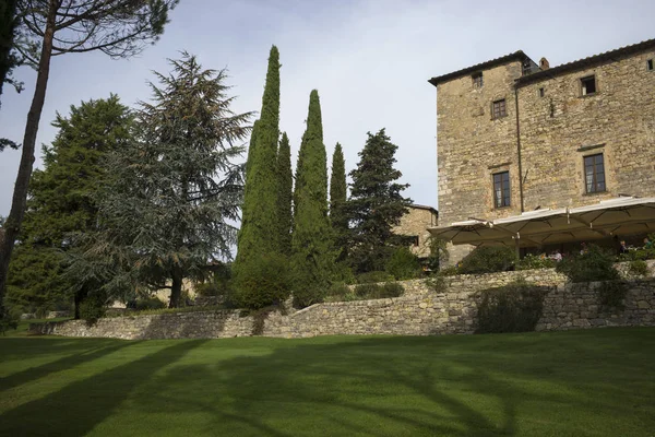 House amidst trees in village, Chianti, Tuscany, Italy