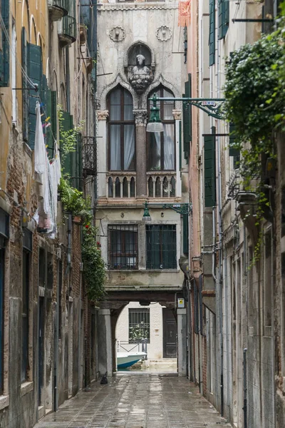 Houses along street by canal, Burano, Venice, Veneto, Italy