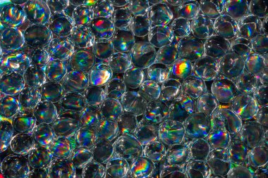 Güzel bir yatay doku gökkuşağı şeffaf hidrojel topları, su boncuk bir grup