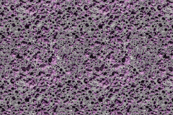 Beautiful texture of purple stone pumice with holes is in the photo — Stock Photo, Image