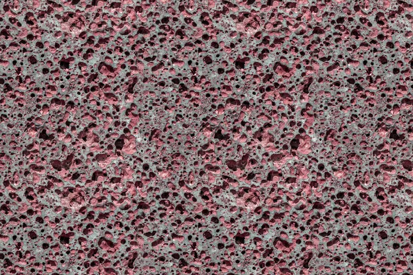 Bela textura de pedra vermelha pomes com buracos está na foto — Fotografia de Stock