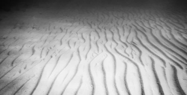 Zand golven onderwater Stockafbeelding