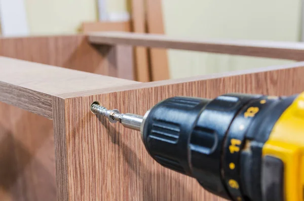 Assembling of furniture power tools — Stock Photo, Image
