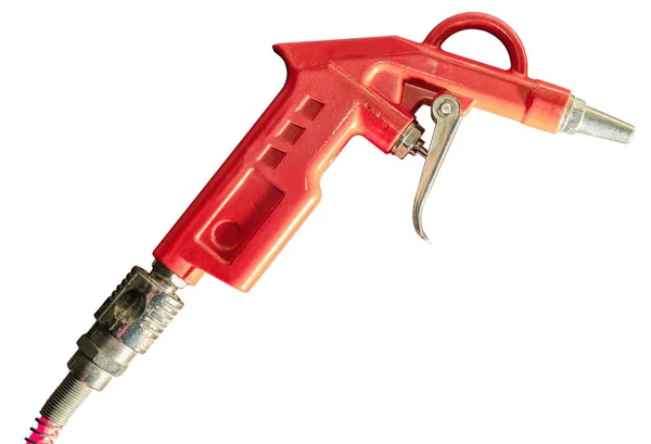 Оранжевый пневматический пистолет — стоковое фото