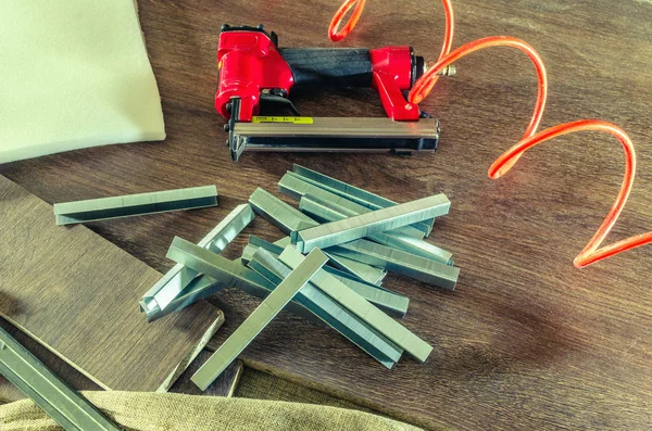 Staples, for a pneumatic stapler, in a carpentry workshop — Stock Photo, Image