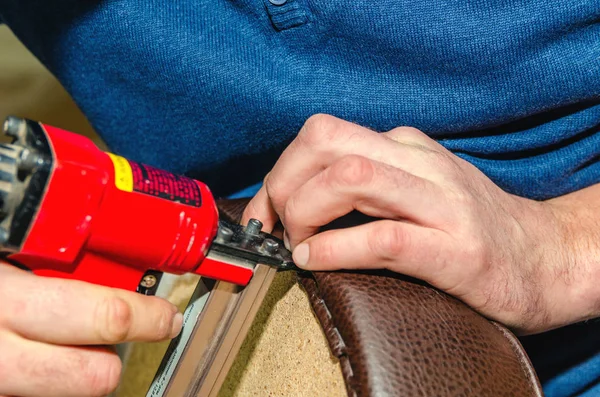 Seat upholstery in a furniture workshop, eco-leather cover — Stock Photo, Image