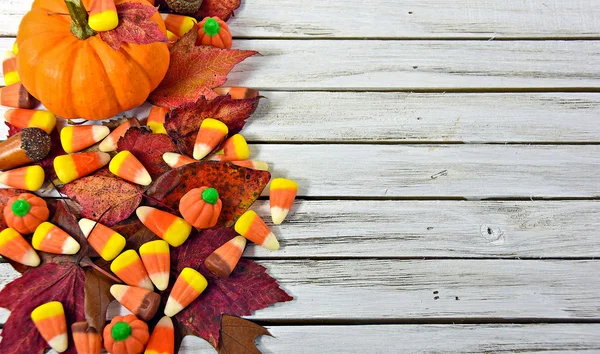 Autumn candy corn on wood — Stock Photo, Image