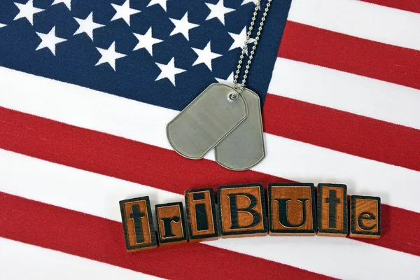 Dog tags and letterpress type on flag — Stock Photo, Image