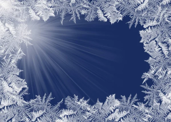 Frosty rand op blauw met licht die stralen worden — Stockfoto