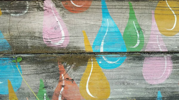 Design de gota de chuva em pintado em madeira — Fotografia de Stock