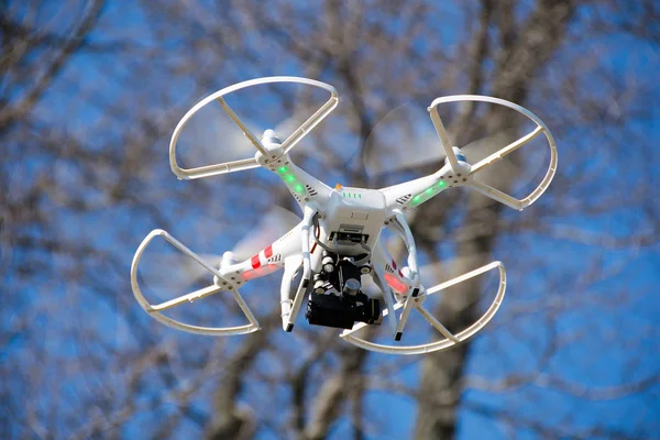 Drone hovering in woods — Stock Photo, Image