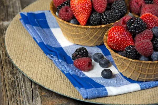 Ripe berries in waffle bowl — Stock Photo, Image