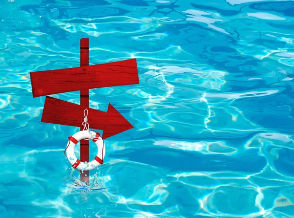 Signe de flèche rouge dans la piscine — Photo