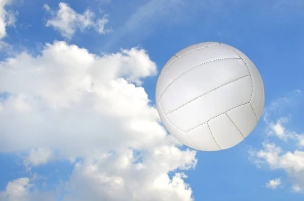Airborne volleyball with sky background — Stock Photo, Image