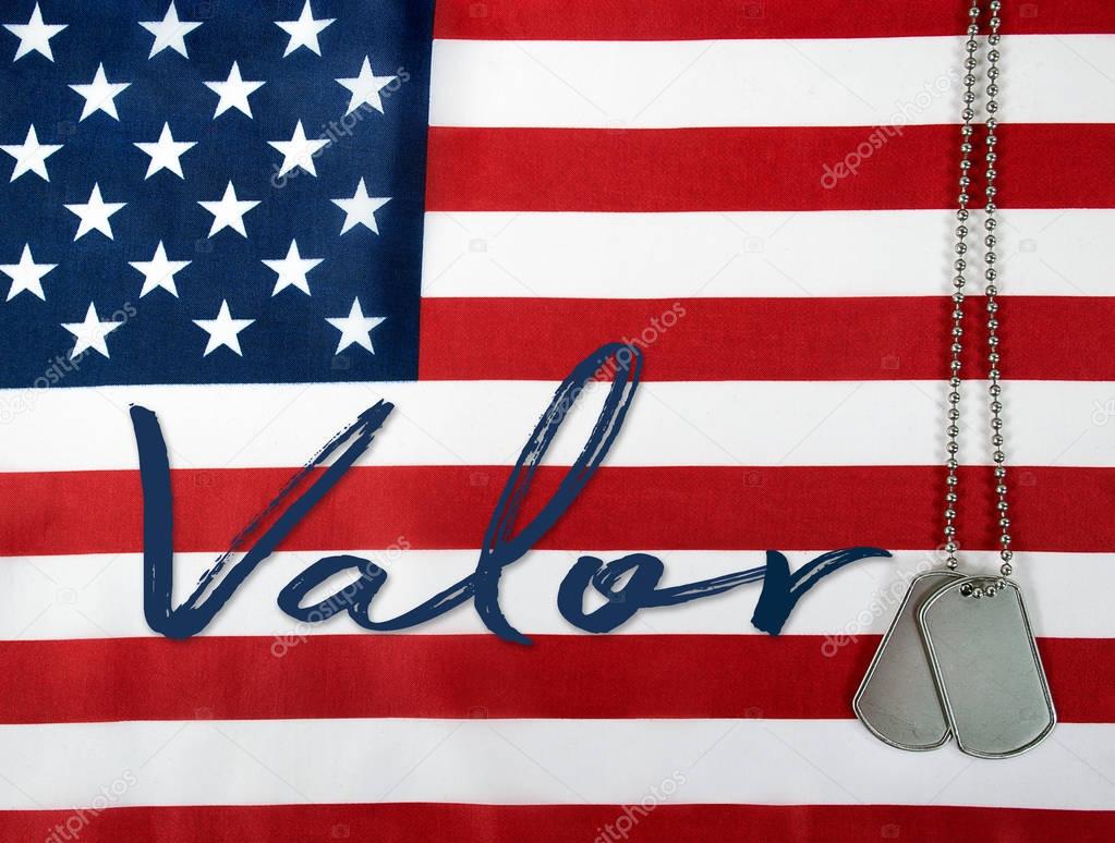 word valor and dog tags on flag