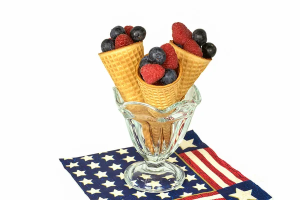 Raspberry and blueberry fruit in cones — Stock Photo, Image