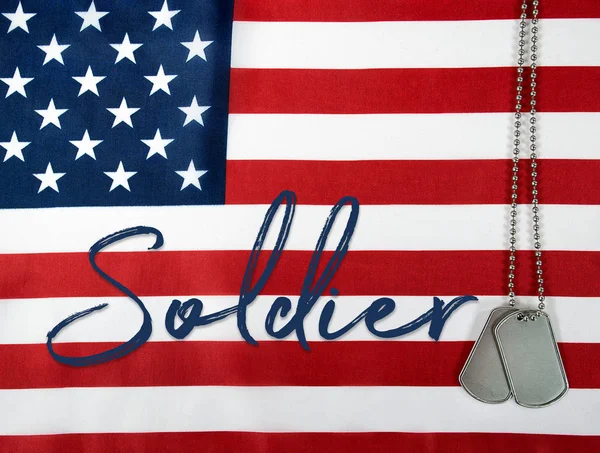 Word solider with dog tags — Stock Photo, Image