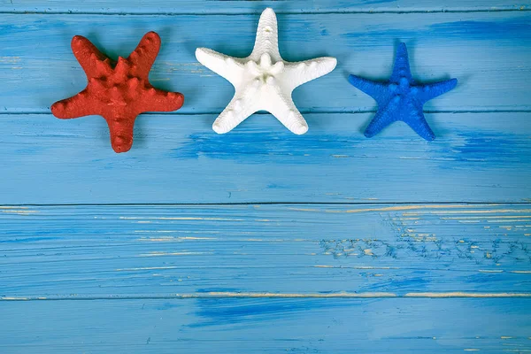 Patriotic starfish on rustic wood — Stock Photo, Image