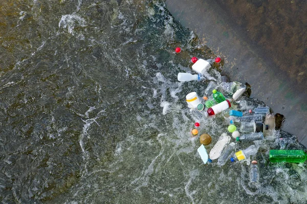 discarded trash in river