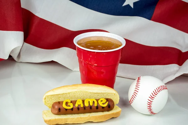 Baseball and hot dog with word game in mustard and beer — Stock Photo, Image