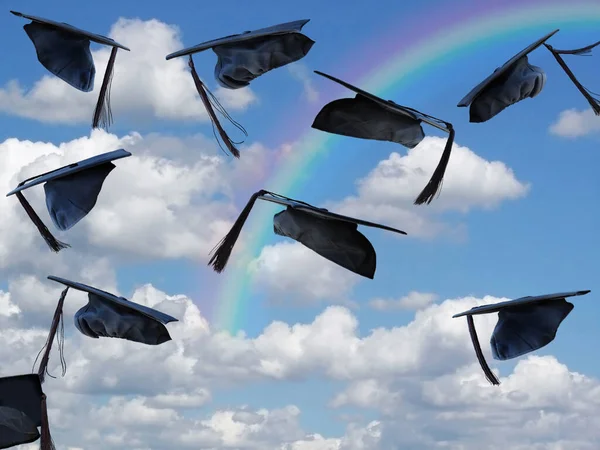 带彩虹的天空中的黑色毕业帽 — 图库照片