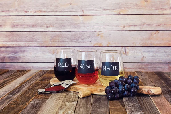 Three color wine flight in label glasses — Stock Photo, Image