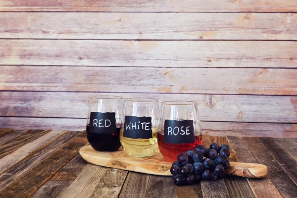 Three color wine flight in label glasses — Stock Photo, Image