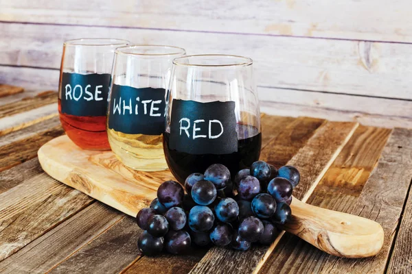 Three color wine flight in label glasses close up — Stock Photo, Image