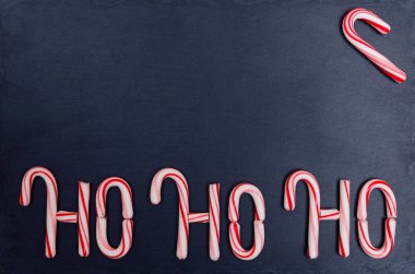 Tatil şeker kamışı Ho-Ho-Ho metin çizgili