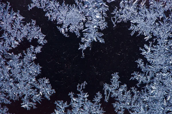 Textura, padrões de neve no vidro — Fotografia de Stock