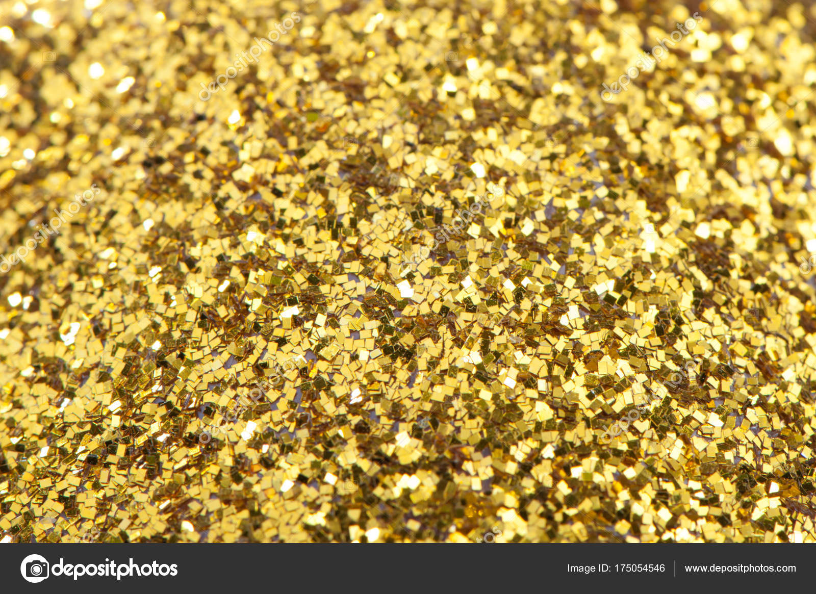 Background of gold sparkles, sweets, shiny gold texture. Stock Photo by