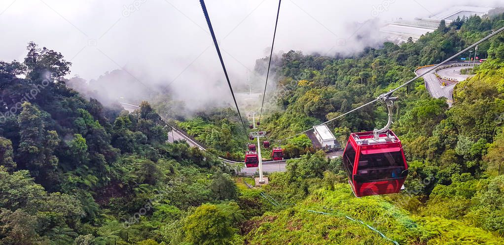 in a ropeway cable car going down from genting highlands to kualampur