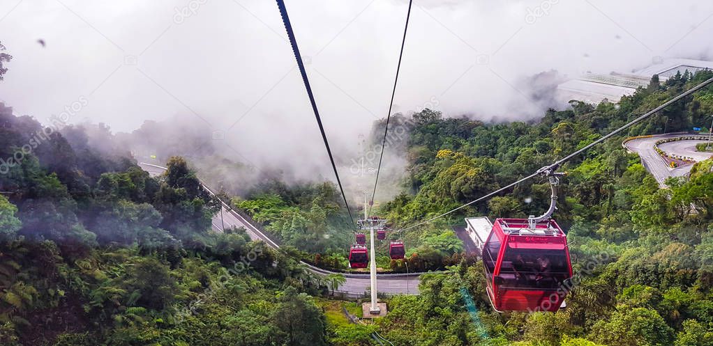 in a ropeway cable car going down from genting highlands to kualampur