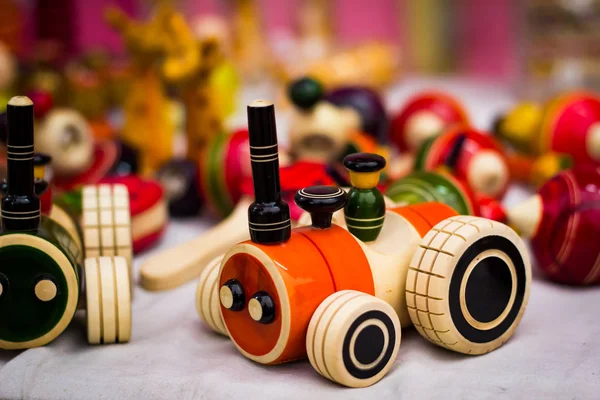 Orange wooden rail roy car to be dragged with thread. vintage wooden toy — Stock Photo, Image