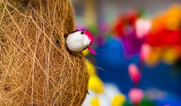 toy baya weaver bird inside its nest. babui pakhi r basha.