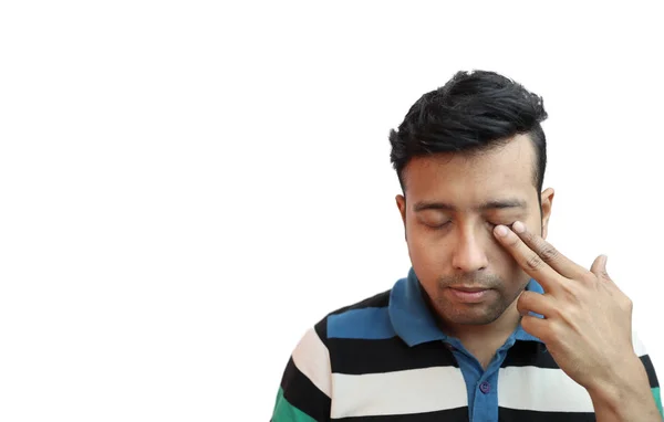 Chico indonesio llorando en estado de ánimo deprimido con el dedo en el ojo en fondo blanco con espacio de copia para text.Sad concepto de estado de ánimo —  Fotos de Stock