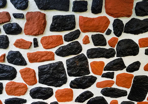 brick stone pattern orange black mosaic concrete wall stone texture background