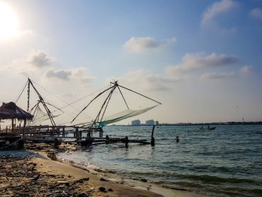 April 20th, 2020-Kochi, Kerala, India- Vacated and deserted chinese fishing net systems during the day in covid 19 Lockdown in Kochi,kerala, India. clipart