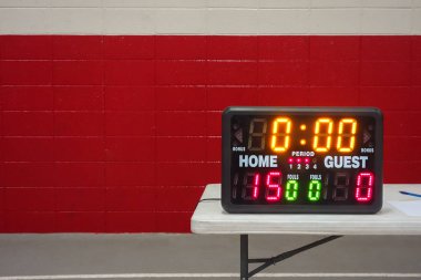 Game day indoor tabletop electronic scoreboard for high school wrestling, basketball or volleyball clipart