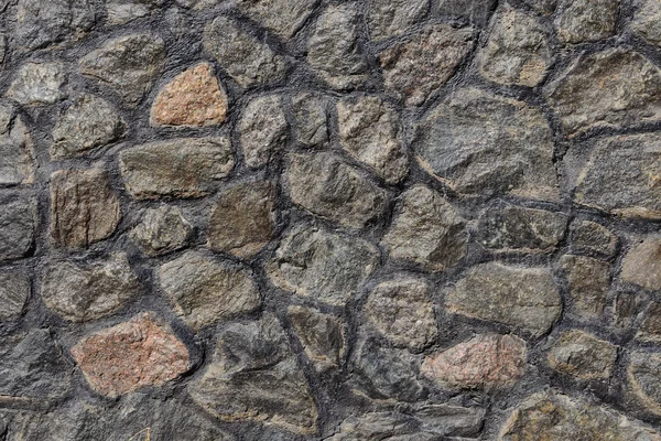 Primer plano de pared de piedra granito desgastado — Foto de Stock