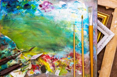 Tablo için arka plan. Tuval fırçalar paleti bıçak.