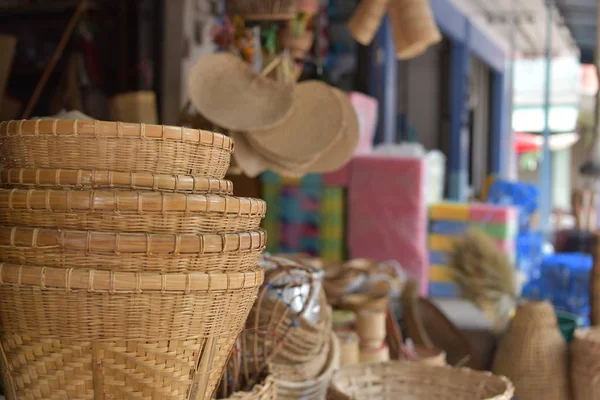 made baskets shop.There are many kind of basket that are made of bamboo.Basket wicker is Thai handmade.it is woven bamboo texture for background. Traditional Thai woven straw texture.