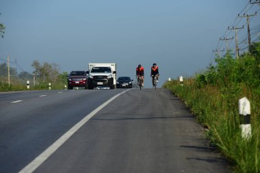 Amatör bisikletçi görsel Engelli olan çocuklar için bir sadaka programında rekabet. Chonburi Chanthaburi, Tayland, thailand, için rota 129 km 17 Mart 2018 olduğunu.