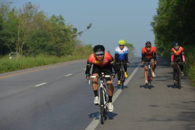 Amatör bisikletçi görsel Engelli olan çocuklar için bir sadaka programında rekabet. Chonburi Chanthaburi, Tayland, thailand, için rota 129 km 17 Mart 2018 olduğunu.