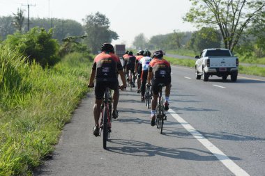Amatör bisikletçi görsel Engelli olan çocuklar için bir sadaka programında rekabet. Chonburi Chanthaburi, Tayland, thailand, için rota 129 km 17 Mart 2018 olduğunu.