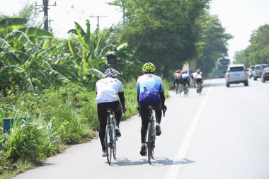 Amatör bisikletçi görsel Engelli olan çocuklar için bir sadaka programında rekabet. Chonburi Chanthaburi, Tayland, thailand, için rota 129 km 17 Mart 2018 olduğunu.