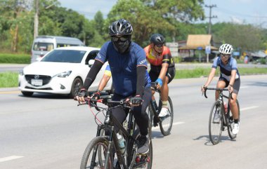 Amatör bisikletçi görsel Engelli olan çocuklar için bir sadaka programında rekabet. Chonburi Chanthaburi, Tayland, thailand, için rota 129 km 17 Mart 2018 olduğunu.