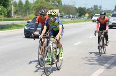 Amatör bisikletçi görsel Engelli olan çocuklar için bir sadaka programında rekabet. Chonburi Chanthaburi, Tayland, thailand, için rota 129 km 17 Mart 2018 olduğunu.
